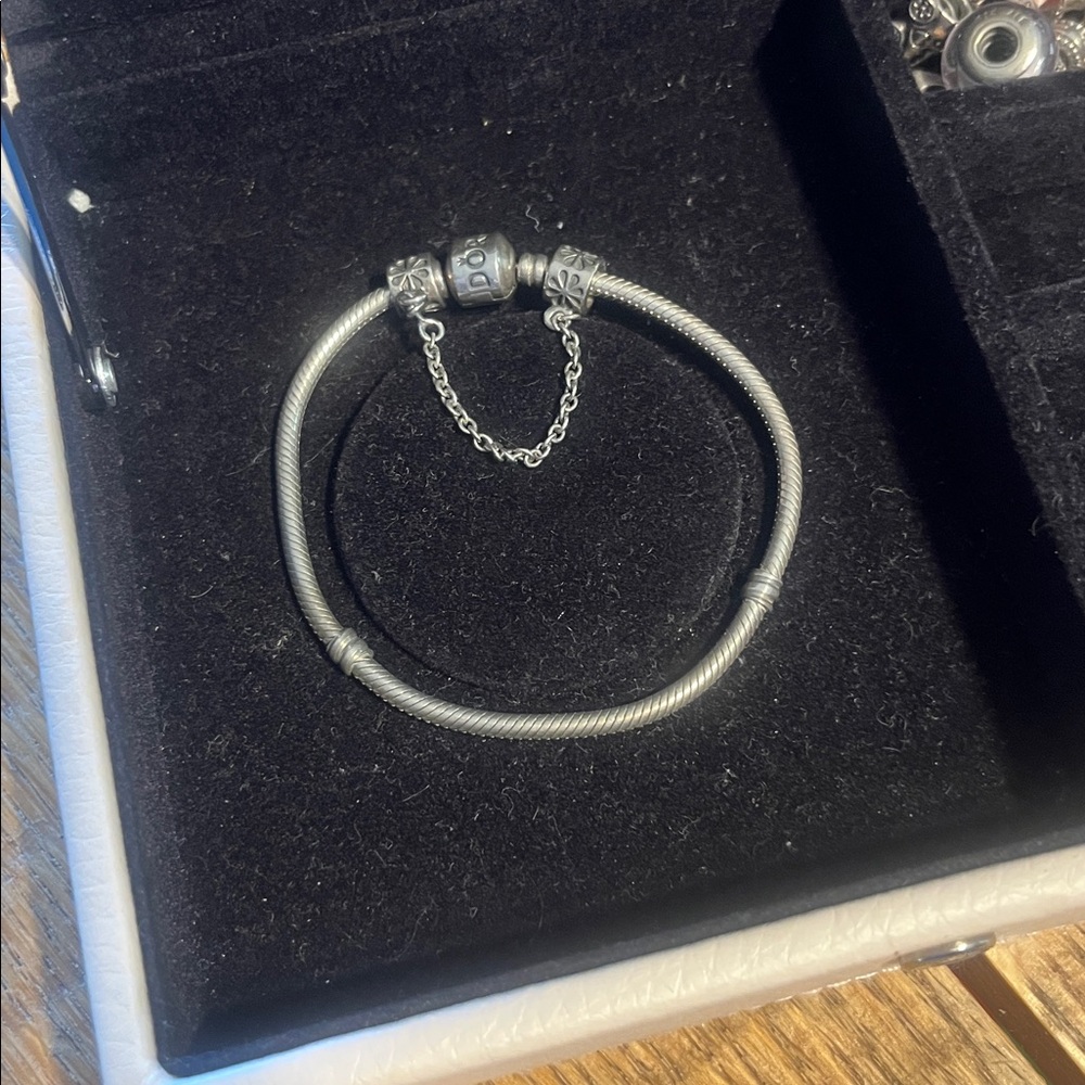 Pandora sterling silver iconic clasp bracelet with SS daisy safety chain